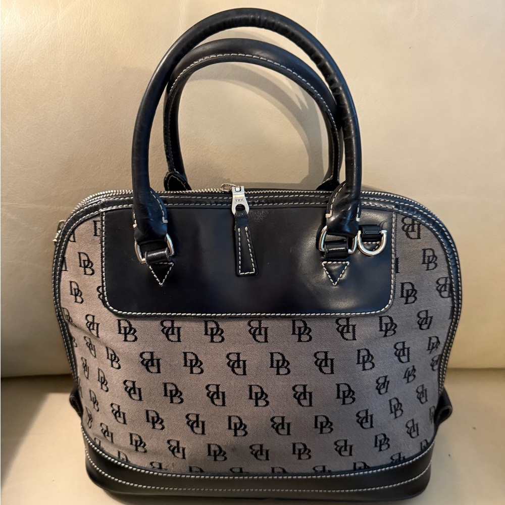 Dooney & Bourke Black and Tan Satchel with Monogram Pattern and Leather Trim